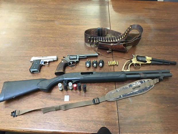Firearms seized after a man allegedly fire at special agents. - HCDTF
