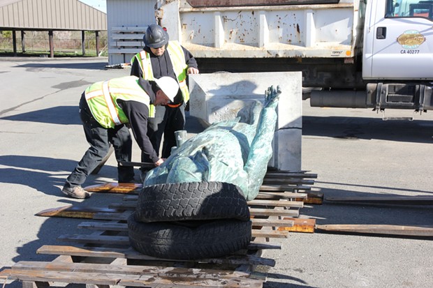 Staff stabilize the McKinley statue to be transported to Canton, Ohio. - COURTESY OF THE CITY OF ARCATA