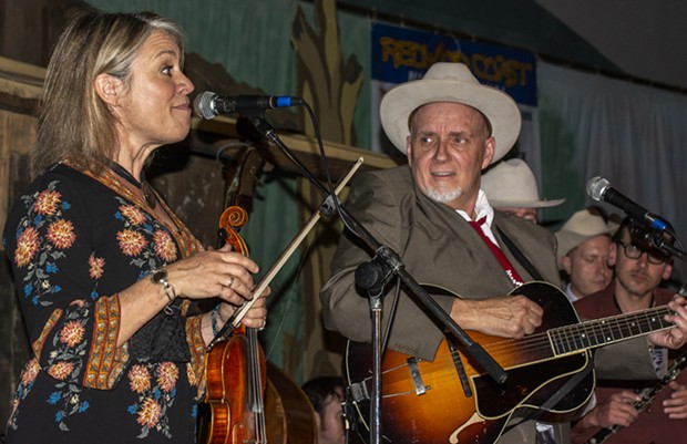 Elana James and Dave Stuckey share a moment during the Western Swing All Stars' performance on Friday night at the Adorni Center. - PHOTO BY MARK LARSON