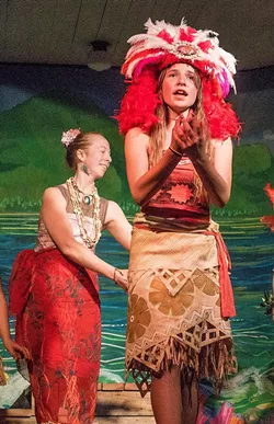 Shekina McCullough as the adventurous island princess Moana and, behind her, teacher's aide Jordan Lambert as the goddess Te Fiti. - PHOTO BY BETTY ANN HANAUER