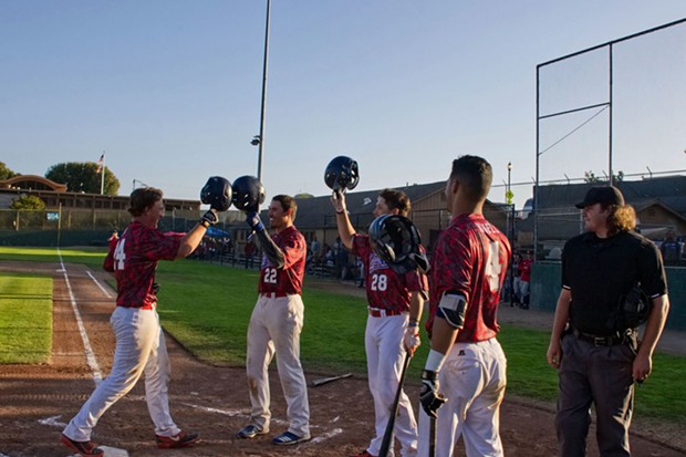 Bryce Kirk is congratulated by his team after hitting his second home run of the game - MATT FILAR