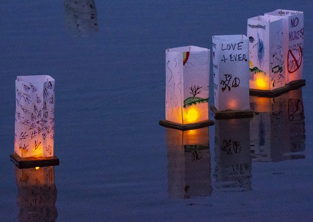 Messages of no-nukes, personal remembrances of loved ones, song lyrics, poetry and art work adorned the floating lanterns. - PHOTO BY MARK LARSON
