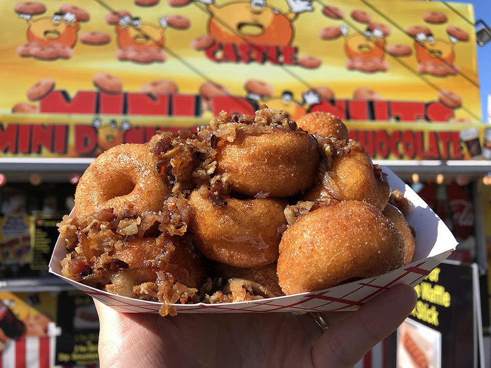 Pig Wheels doughnuts with bacon and maple flavored syrup. - PHOTO BY JENNIFER FUMIKO CAHILL