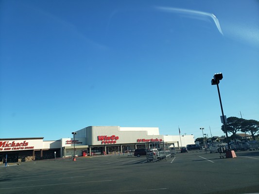 The vacant parking lot in front of a shuttered WinCo Foods on Wednesday morning. - KALI COZYRIS