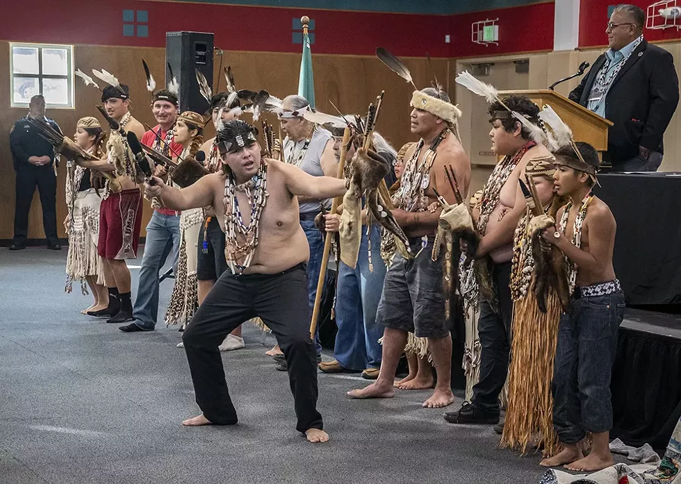 Wiyot tribal members perform the Brush Dance, a dance of healing, during the ceremony commemorating the repatriation of Duluwat Island to the tribe. - BY MARK LARSON