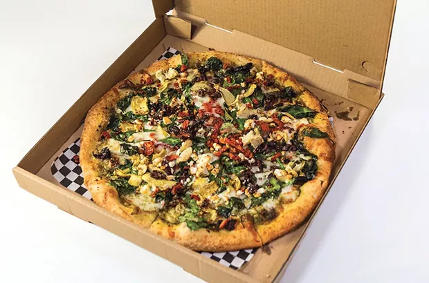 The Greek-inspired pizza at Shenanigans. - PHOTO BY ZACH LATHOURIS