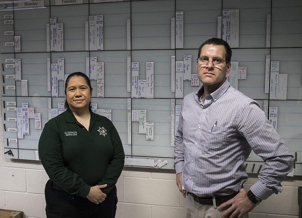 With the Humboldt County jail's population changing under California's prison realignment laws, Administrative Sgt. Delia Garcia (left) and former Programs Coordinator Stefan Logie have been focusing more attention and resources on rehabilitative services. - PHOTO BY T. WILLIAM WALLIN