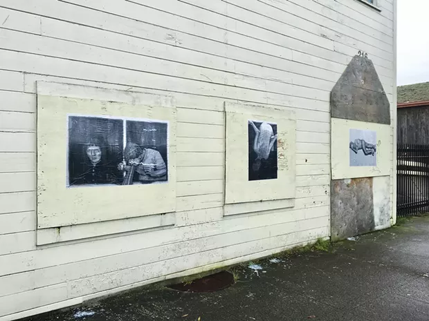 The wheatpasted black and white copies of Weidel's original Heroin Hilton images. - PHOTO BY JESSE WIEDEL