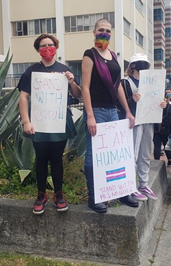 Cora Woodard and their supporters stand up against hate outside the Humboldt County courthouse. - SUBMITTED