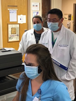 Registered nurse Melanie Smits (foreground) with hospitalist Paul Shen and registered nurse Celene Olson. - SUBMITTED