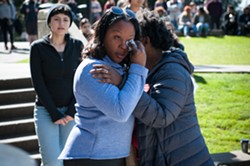 Charmaine Lawson dabs her eyes before addressing the crowd at a vigil held for her son at Humboldt State University in 2019. - MARK MCKENNA