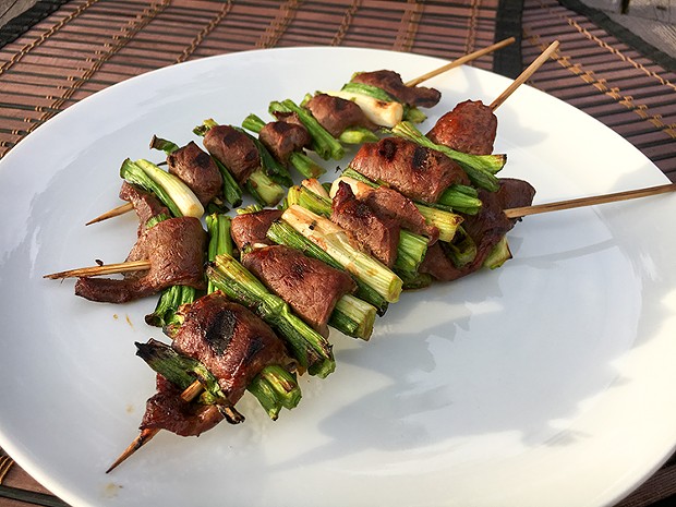 Feel the love with grilled beef heart and green onions. - PHOTO BY JENNIFER FUMIKO CAHILL