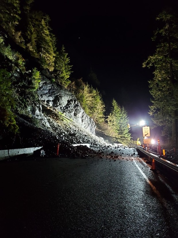 Caltrans' crews work to clear a landslide at Last Chance Grade on U.S. Highway 101. - CALTRANS
