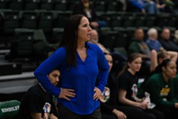 HSU Women's Basketball Coach Michelle Bento-Johnson coaching during a game last season. - HSU ATHLETICS