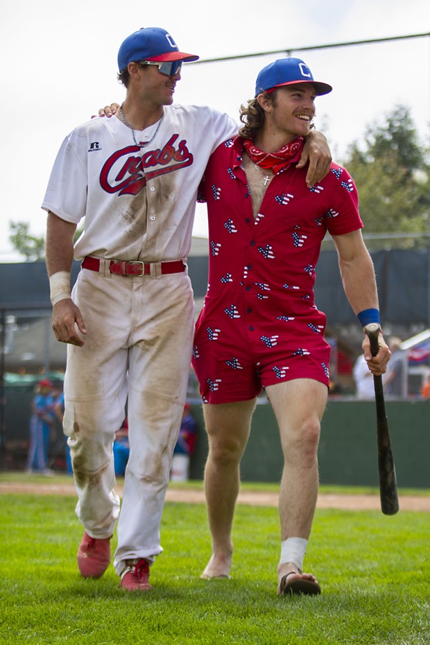 Crabs first baseman Gabe Giosso (Left) and outfielder Josh Lauck (Right) walk back to the dugout after retrieving a bat during the Crabs' game against the Solano Mudcats on July 4, 2021 at Arcata Ballpark. - THOMAS LAL