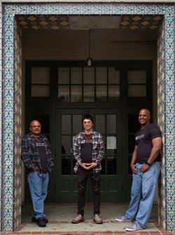Mark Taylor, left, Tony Wallin and Eric Clark, far right, at the Humboldt State University campus - PHOTO BY DAVE WOODY
