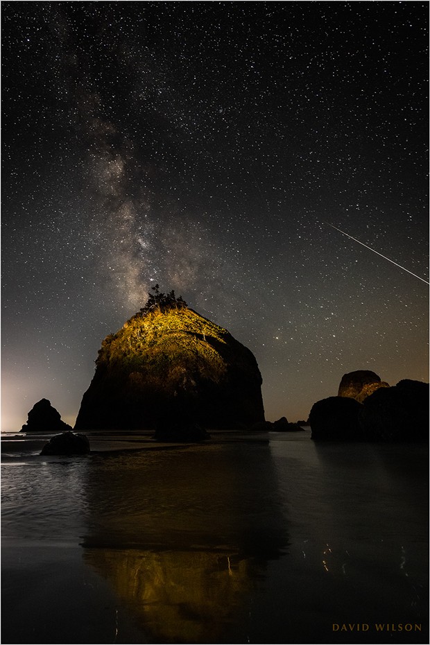 The one that got away. A large meteor streaks off the edge of the frame off the coast of Houda Beach. I had it by the tail…! The truth of the matter is that this is cropped in from the left edge; for some reason I had the great rock centered. If I had composed it the way I knew I should have at the time, the entire meteor would have been in. This is why my hair is gray. September 10, 2021, in Humboldt County, California. - DAVID WILSON