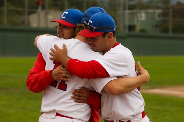 Crabs pitcher Marcelo Saldana (Left), Garrison Finck (Center), and Kelan Scanlan (Right) embrace after the last game of the 2022 season at Arcata Ballpark on Aug. 7. - THOMAS LAL
