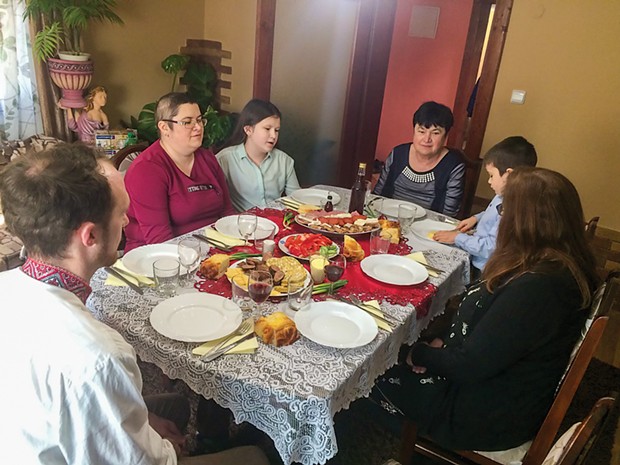 Ryan Knight, gathers at the dinner table with the Shetalia family. - SUBMITTED