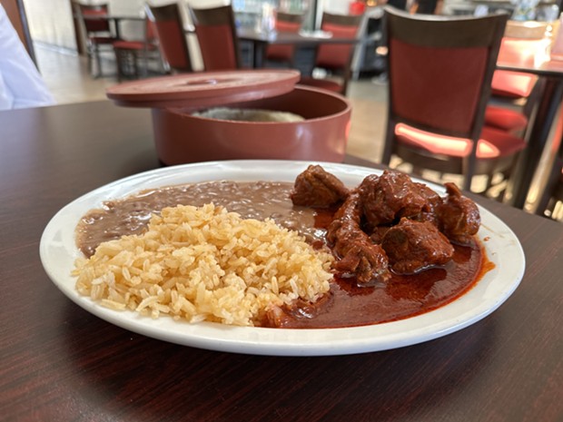 Stewed pork costillitas made with chile California. - PHOTO BY JENNIFER FUMIKO CAHILL