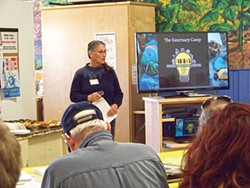Affordable Homeless Housing Alternatives President Nezzie Wade presents information about a sanctuary camp proposal on March 7. - LINDA STANSBERRY
