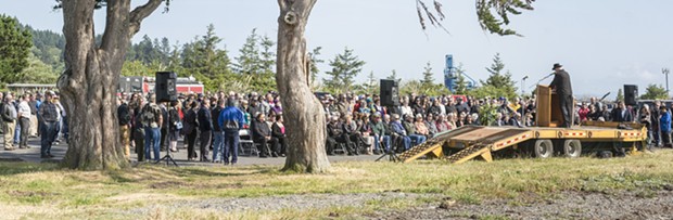 Pastor Rick McRostie, of Eureka, began the memorial for Jimmy Smith held Friday, May 27 at the Jimmy Smith Fields Landing Boat Launch in Fields Landing. - MARK LARSON