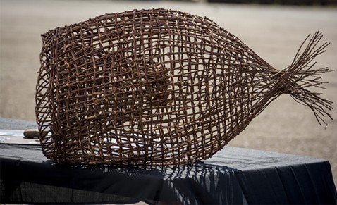 A woven basket used to catch Pacific lamprey, commonly called eels, was one of many items displayed at an exhibit of Yurok traditions. Eels enter the Klamath River to spawn and are part of the Yurok seasonal diet. - MARK LARSON