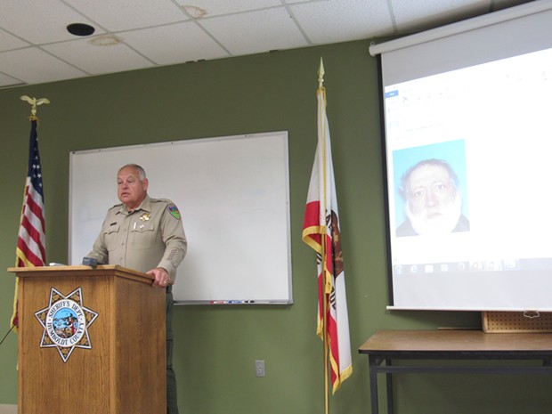 Sheriff Mike Downey recounts the events of the standoff  at a press conference. - LINDA STANSBERRY