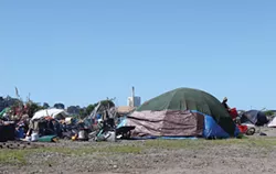 Some people said they had been living behind the mall for decades. - FILE