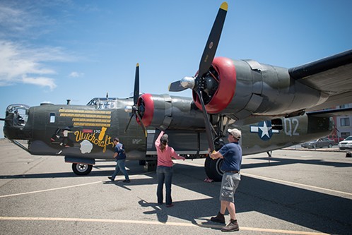 The crew of the Witchcraft, a B-24 Liberator, prepares for takeoff. - PHOTO BY MARK MCKENNA