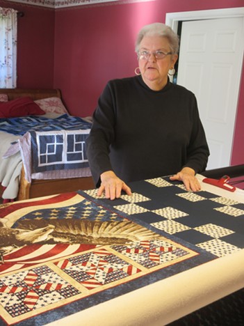 Mimi Mace is the driving force behind the 1,000 quilts per year sewn and donated by Redwood Empire Quilters Guild to a variety of local charities. - PHOTO BY CAROL HARRISON