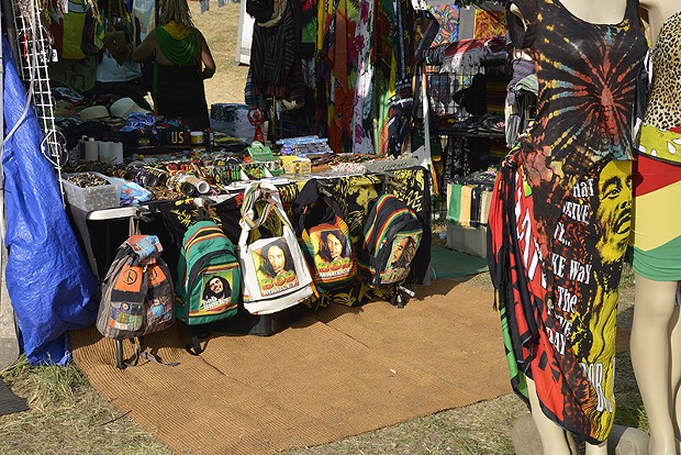 Bob Marley's likeness continued to be popular on backpacks and other merchandise items, like the ones photographed here Sunday afternoon. - PHOTO BY ERICA BOTKIN