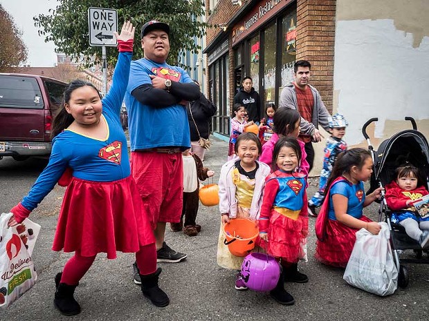 A super family touched down in Old Town for Halloween trick or treating. - PHOTO BY MARK LARSON