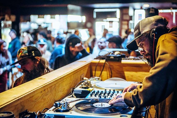 DJ Rickshaw spinning Lee's favorite tunes. - PHOTO BY ZEV SMITH-DANFORD
