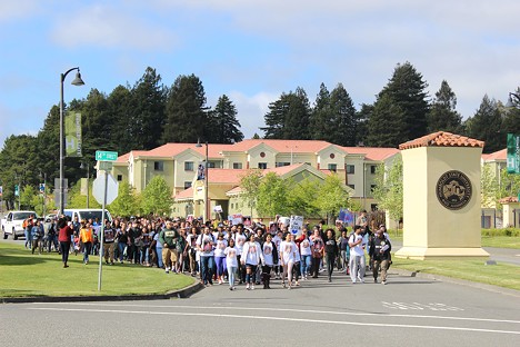 Protesters march from Humboldt State University to Arcata City Hall, demanding "justice for Josiah" Lawson. - THADEUS GREENSON