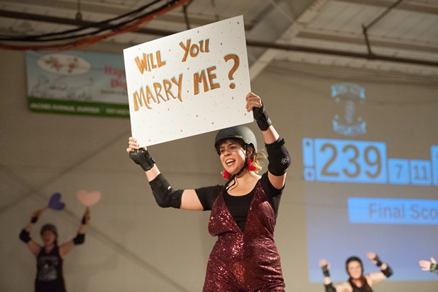 Natalie Arroyo proposes to Jason Lopiccolos at the final derby bout of the season. - PHOTO BY MARK MCKENNA