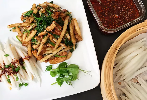 Pin noodles with chili sauce, pan fried or straight from the pot. - PHOTO BY WENDY CHAN
