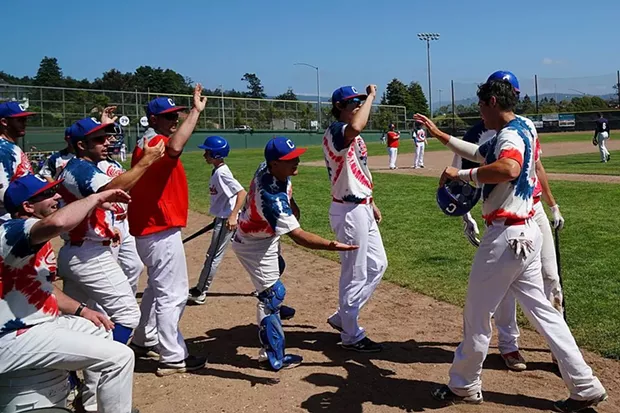 Crabs celebrate a run during Saturday's game. - MATT FILAR