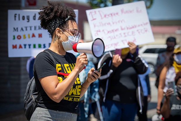 Monique Desir addresses the crowd in front of Eureka Police Headquarters on June 1.
