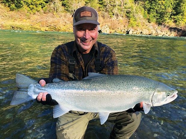 Dave McGrouther, of Menlo Park, holds a 15-pound steelhead he caught and released Dec. 27 while fishing the Smith River with guide Mick Thomas of Lunker Fish Trips. He was using roe near Jedediah Smith State Park.