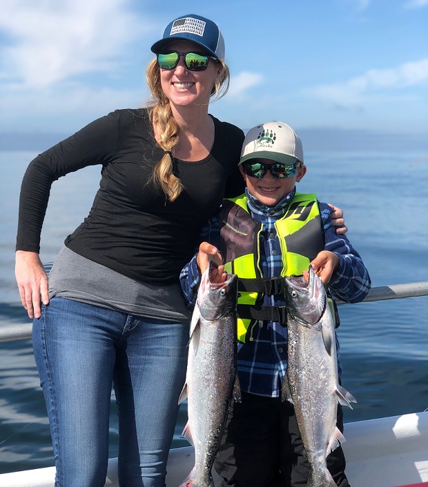 Nine-year-old Ryder Gregory is all smiles after catching his limit of king salmon with Heidi Musick out of Trinidad a few years back. Low abundance of salmon in the ocean has put this year's ocean and river salmon seasons in jeopardy.
