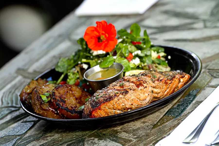 Local salmon brushed with lemon-dill butter and served with a wild and generous salad and grilled beets at Larrupin. - TERRENCE MCNALLY