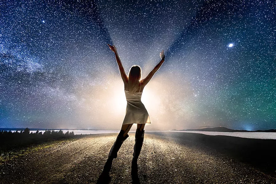 "She's Free." Somewhere on Monument Road/Bear River Ridge Road. At about 11:30 p.m. on our ridgetop we were surrounded by a sea of fog. Around us in the distance were other ridges, connecting with each other above the foggy carpet. Model: Morgan Crowl. May 14, 2018. - PHOTO B Y DAVID WILSON