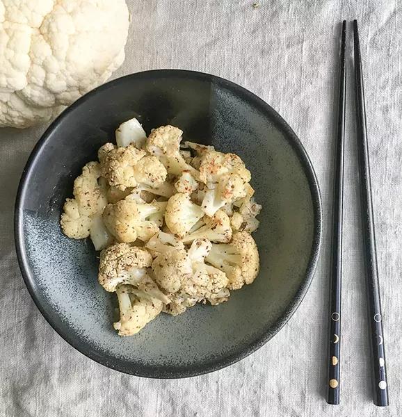 Sweet, roasted cauliflower tossed with fragrant za'atar paste. - PHOTO BY SIMONA CARINI