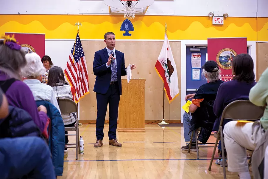 North Coast state Sen. Mike McGuire talks about the PG&E blackout at an Oct. 10 community meeting in Blue Lake. - PHOTO BY SAM LEISHMAN