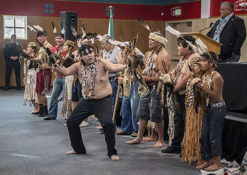 Wiyot tribal members perform the Brush Dance, a dance of healing, during the ceremony commemorating the repatriation of Duluwat Island to the tribe. - BY MARK LARSON