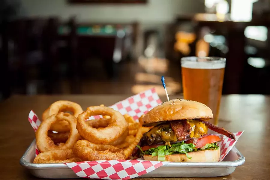 Bacon cheeseburger on a homemade bun. - PHOTO BY AMY KUMLER.