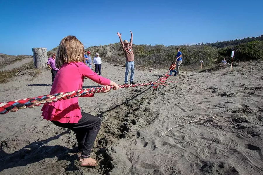 Tug-o-war at the Ma-le'l Dune. - COURTESY OF FRIENDS OF THE DUNES