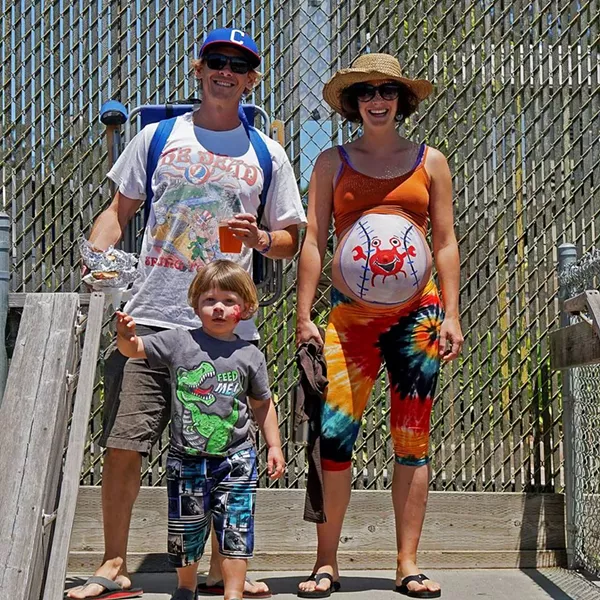 Jenny Karevoll (right, amazing painted stomach) and family - MATT FILAR