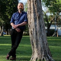 David Walter stands for a portrait at Encino Park in Encino on March 23, 2021. David is an adjunct professor at UC Berkeley lecturing on humanities and creative writing.